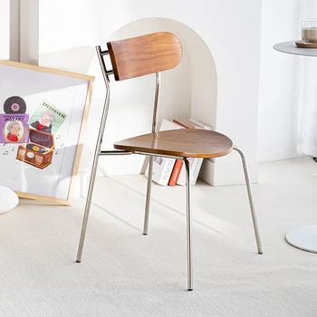 מעצב הבית כסאות אוכל נורדי ברזל אמנות כיסאות בחדר האוכל מודרני מינימליסטי משענת כסא עץ מלא מושב מסעדה מלון