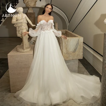 Aedmgh סקסי סטרפלס פאף שרוולים שמלות חתונה 2023 רומנטי אפליקציות 3D פרחים ללא משענת קו רכבת בית משפט חלוק דה Mariee